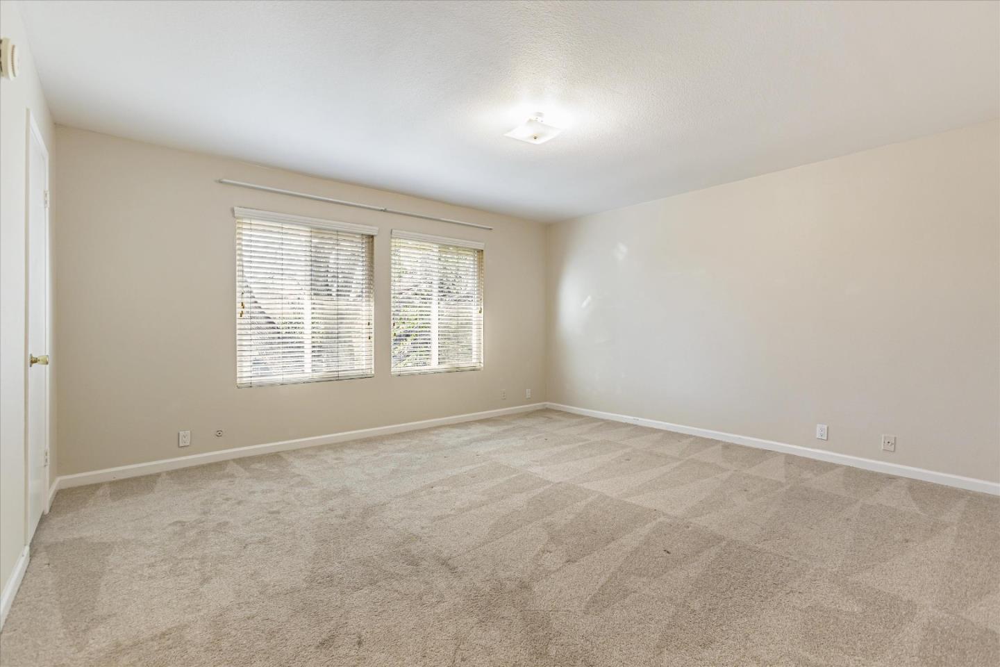 4260 Clayton Road, Unit 20 Concord, CA 94521 - Photo 13 of 35 an empty room with windows