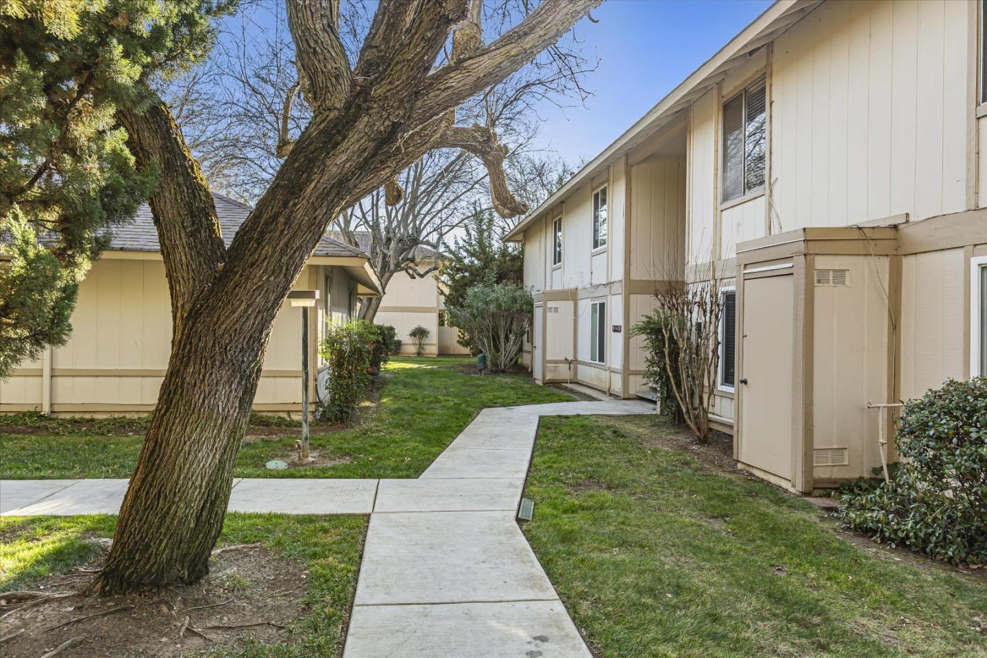 4260 Clayton Road, Unit 20 Concord, CA 94521 - Photo 31 of 35 a front view of a house with a yard