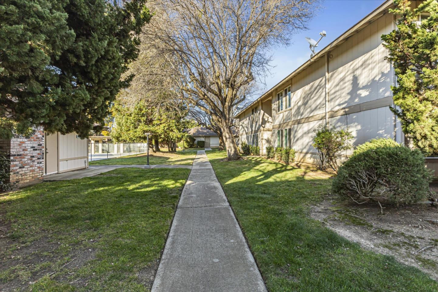 4260 Clayton Road, Unit 20 Concord, CA 94521 - Photo 35 of 35 a front view of a house with a yard