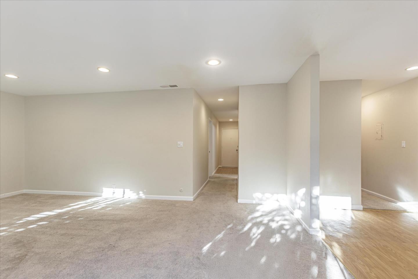 4260 Clayton Road, Unit 20 Concord, CA 94521 - Photo 9 of 35 a view of a livingroom with wooden floor