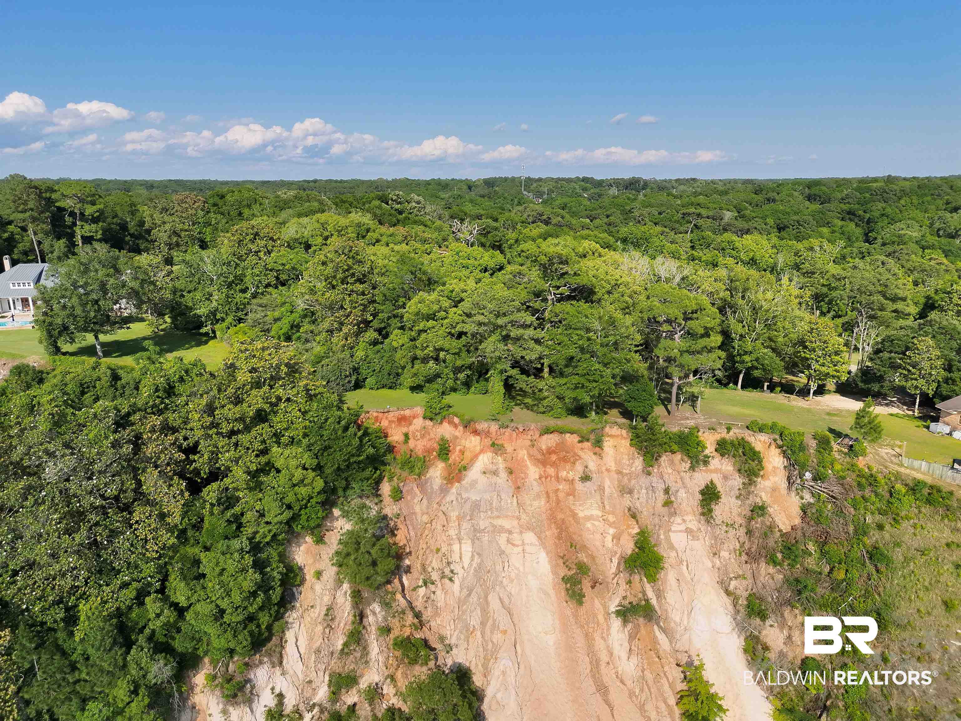 22951 Main Street Fairhope, AL 36532 - Photo 4 of 13 Aerial view looking back at the property above the bay