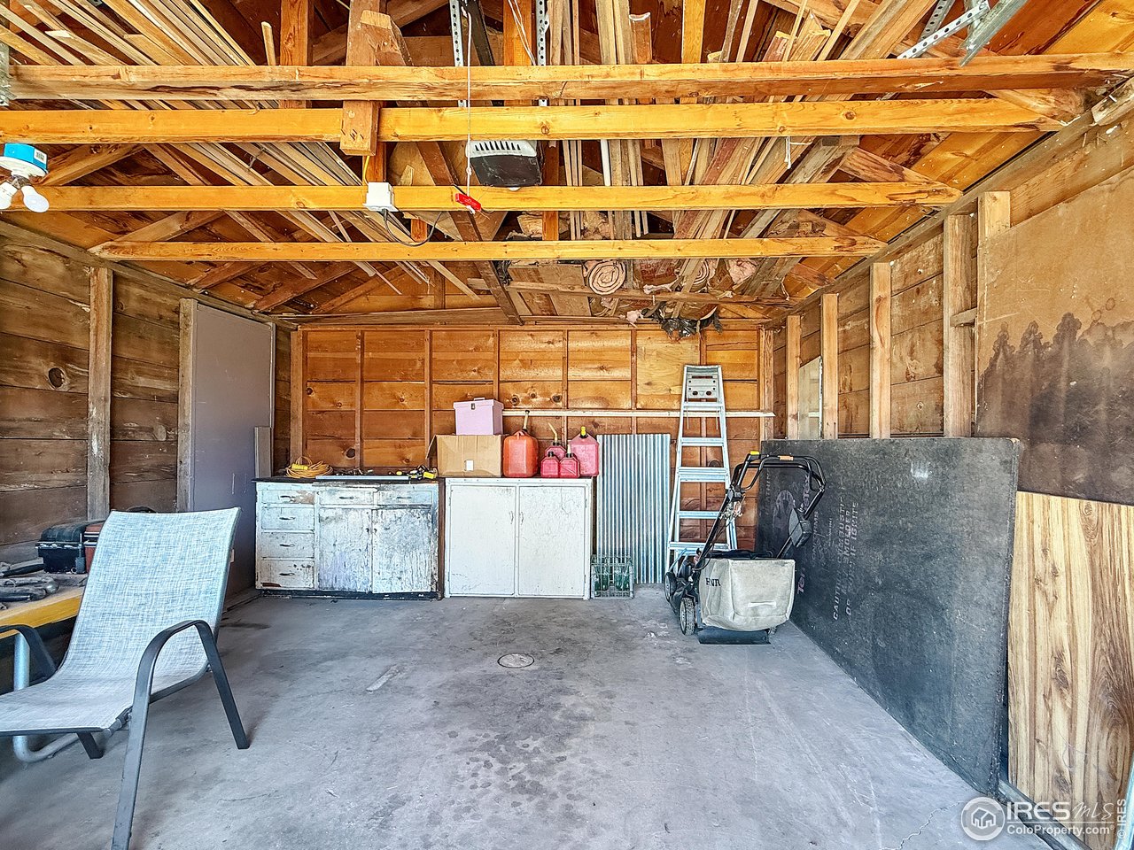 531 Taylor Street Sterling, CO 80751 - Photo 33 of 38 a view of a patio with table and chairs
