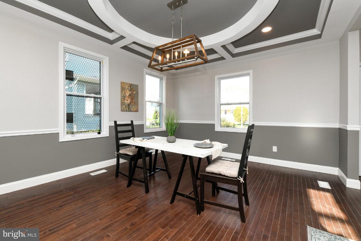 3815 Chatham Road Baltimore, MD 21215 - Photo 18 of 28 a view of a dining room with furniture window and wooden floor