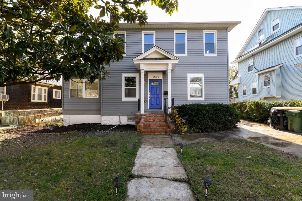 3815 Chatham Road Baltimore, MD 21215 - Photo 3 of 28 a front view of a house with a yard