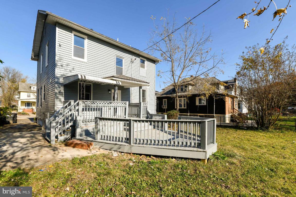 3815 Chatham Road Baltimore, MD 21215 - Photo 5 of 28 a view of a house with wooden fence
