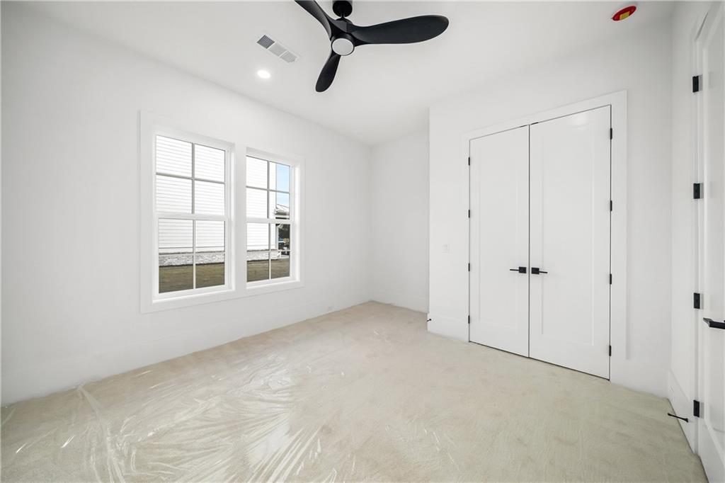 245 Lask Lane Milton, GA 30004 - Photo 38 of 87 a view of an empty room with a window