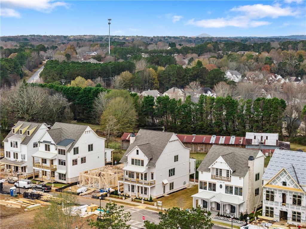 245 Lask Lane Milton, GA 30004 - Photo 58 of 87 an aerial view of residential houses with city view and lake view