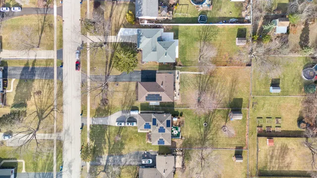 a aerial view of residential houses with outdoor space