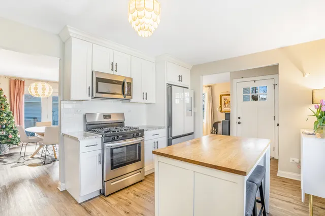 a kitchen with a stove and a microwave