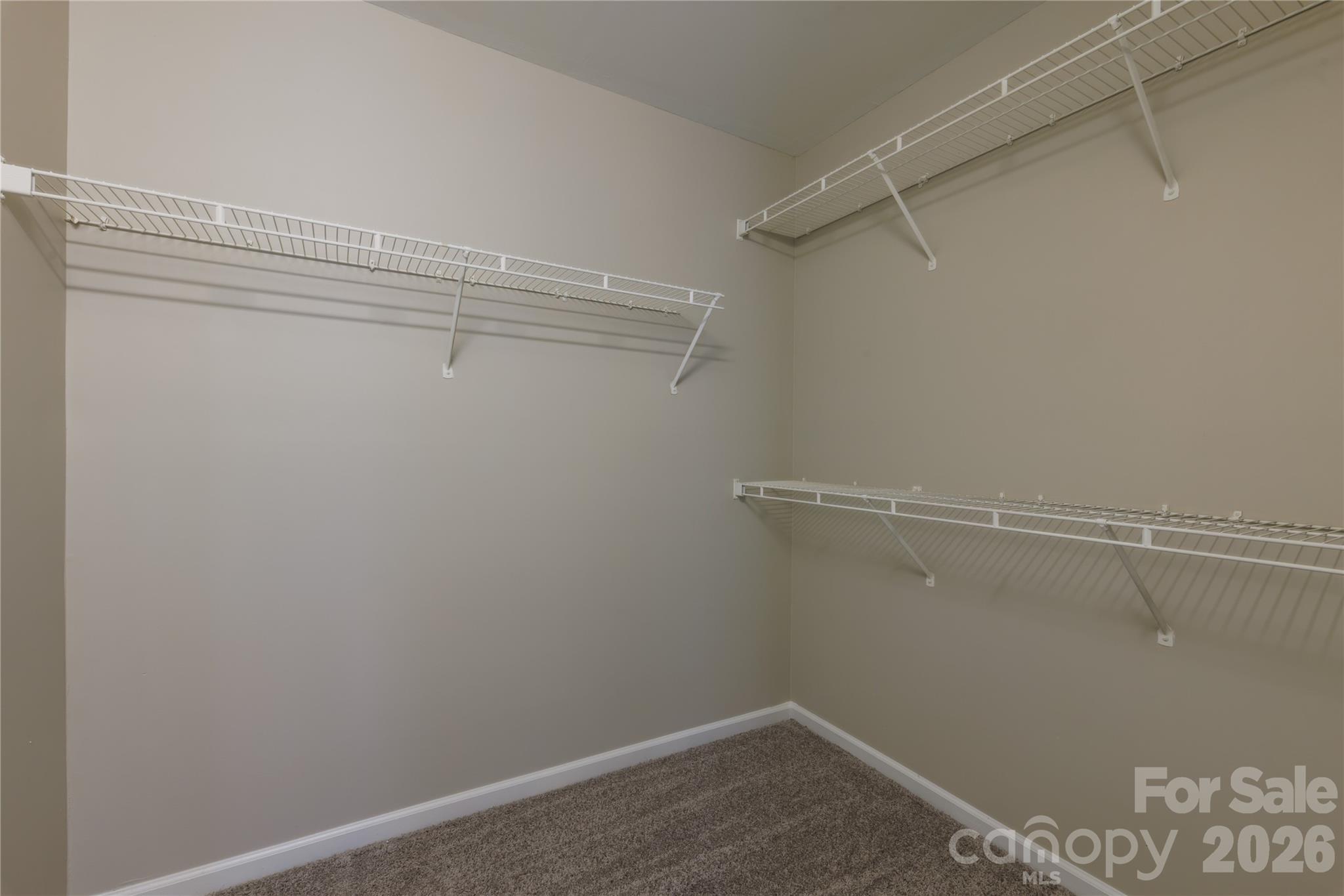 7111 Rumple Road Charlotte, NC 28262 - Photo 11 of 18 a view of a room with racks on the wall