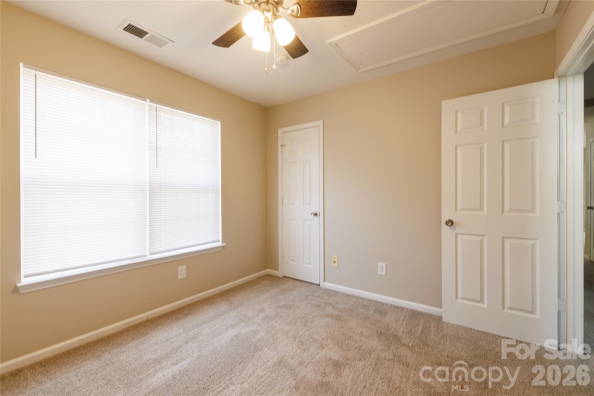 7111 Rumple Road Charlotte, NC 28262 - Photo 15 of 18 a view of an empty room with a window
