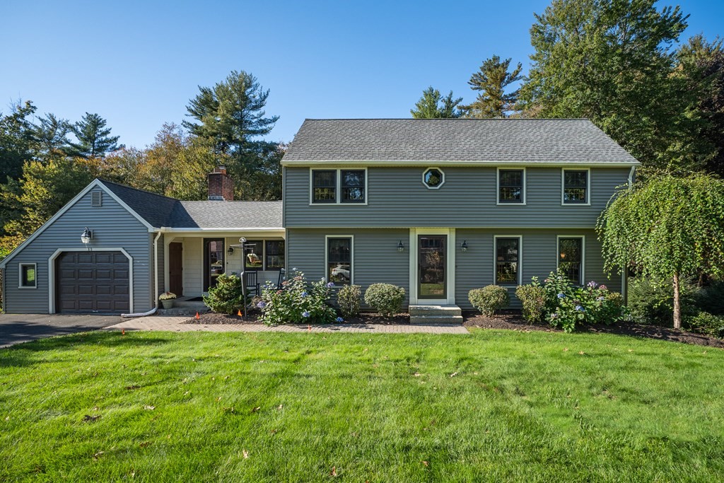 53 Yankee Circle Westfield, MA 01085 - Photo 1 of 42 a front view of house with yard and green space