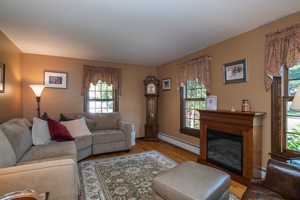53 Yankee Circle Westfield, MA 01085 - Photo 20 of 42 a living room with furniture and a fireplace