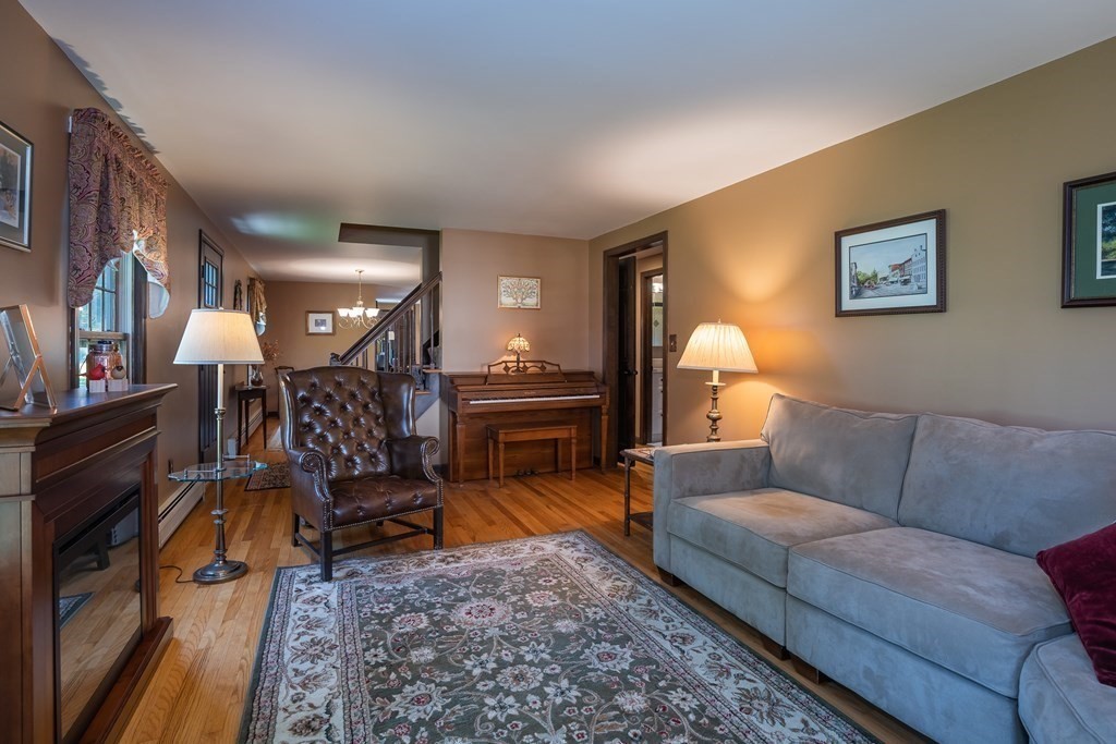 53 Yankee Circle Westfield, MA 01085 - Photo 21 of 42 a living room with furniture and a fireplace
