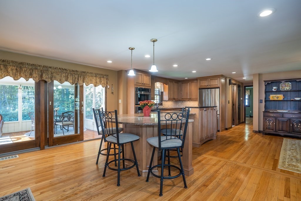 53 Yankee Circle Westfield, MA 01085 - Photo 9 of 42 a view of a dining room with furniture window and wooden floor