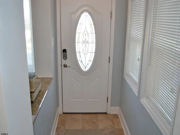 a view of front door with small space