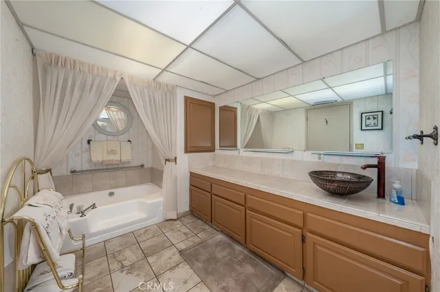 a view of livingroom with furniture and floor to ceiling window