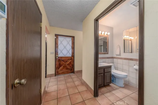 a backyard of a house with outdoor seating