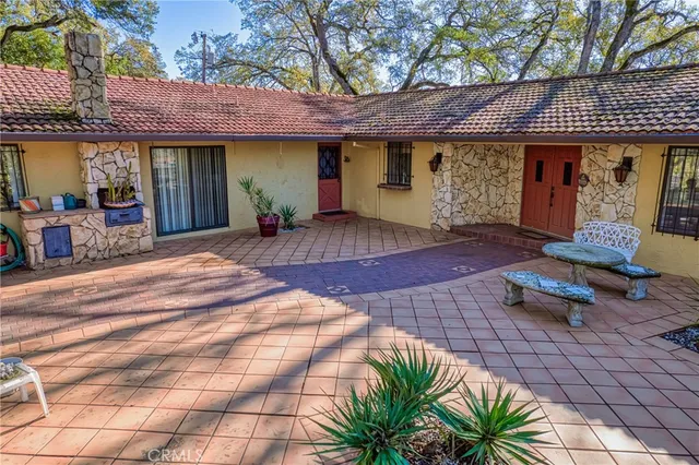 a view of a backyard of the house