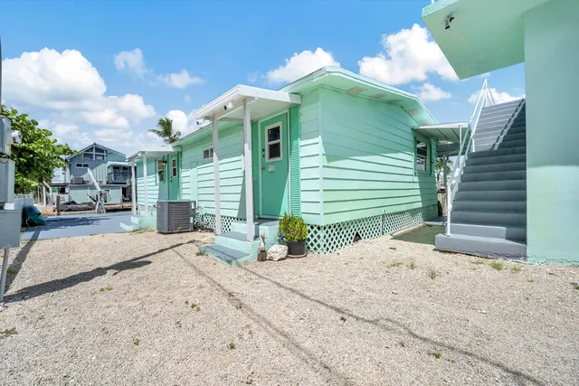 a view of swimming pool with outdoor seating