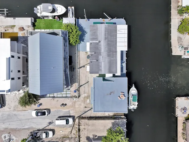 an aerial view of a house with a garden