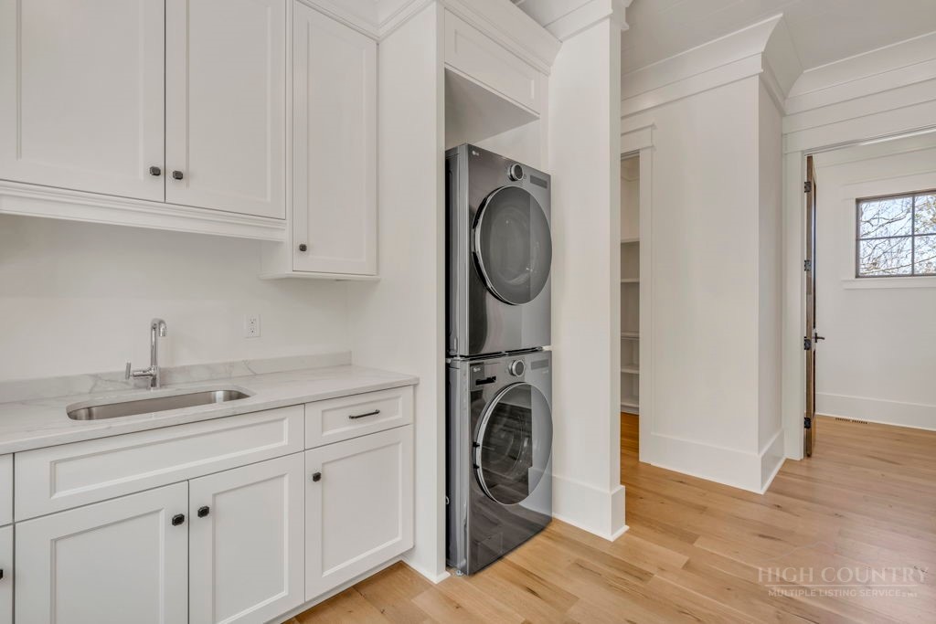 536 Boone Ridge Lane Boone, NC 28607 - Photo 22 of 50 a view of a storage and utility room with washer and dryer