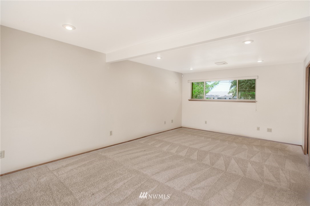 619 Southwest Normandy Road Normandy Park, WA 98166 - Photo 12 of 24 an empty room with windows