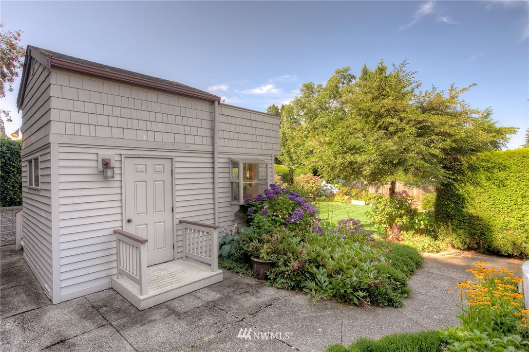 619 Southwest Normandy Road Normandy Park, WA 98166 - Photo 18 of 24 a view of a house with a yard