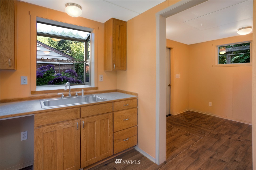 619 Southwest Normandy Road Normandy Park, WA 98166 - Photo 19 of 24 a view of a sink and a window