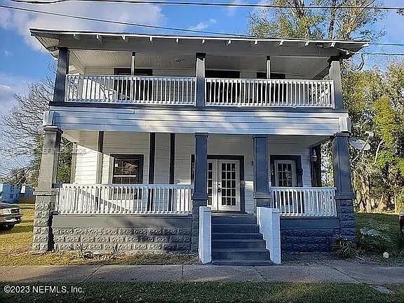 front view of a house with a deck