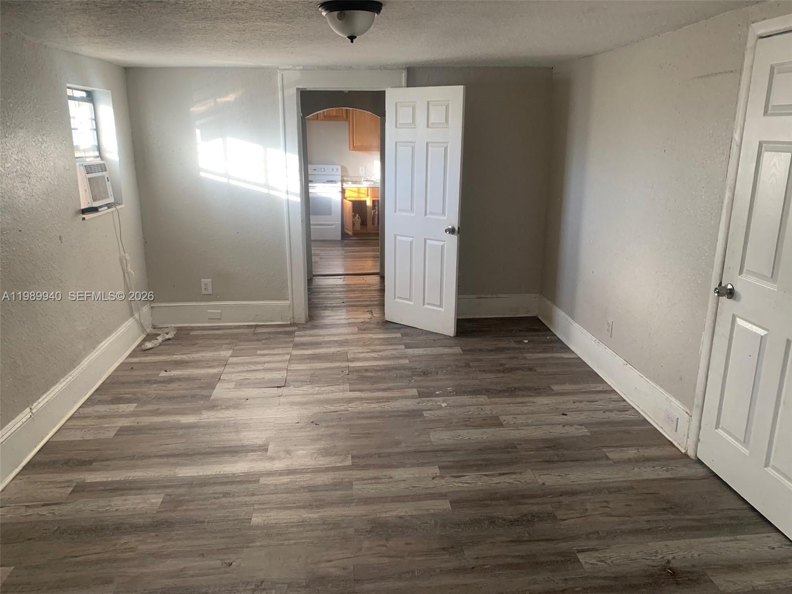 1129 Grothe Street Jacksonville, FL 32209 - Photo 14 of 21 a view of empty room with wooden floor