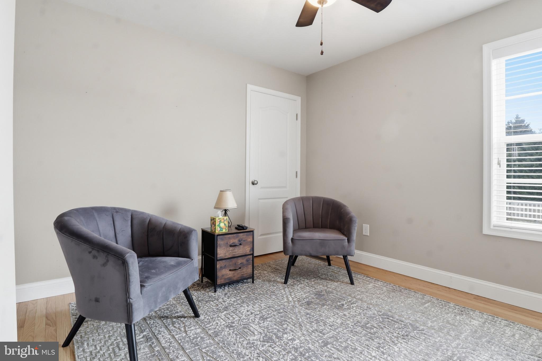 6083 Jennifer Lane Spring Grove, PA 17362 - Photo 28 of 61 a living room with furniture and a chair