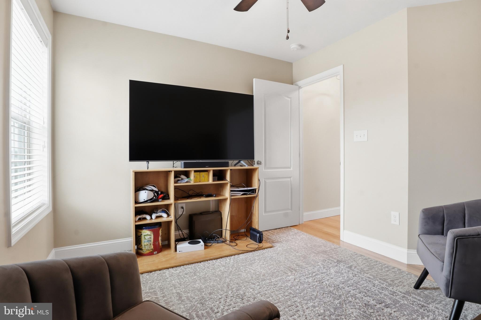 6083 Jennifer Lane Spring Grove, PA 17362 - Photo 29 of 61 a living room with furniture and a flat screen tv