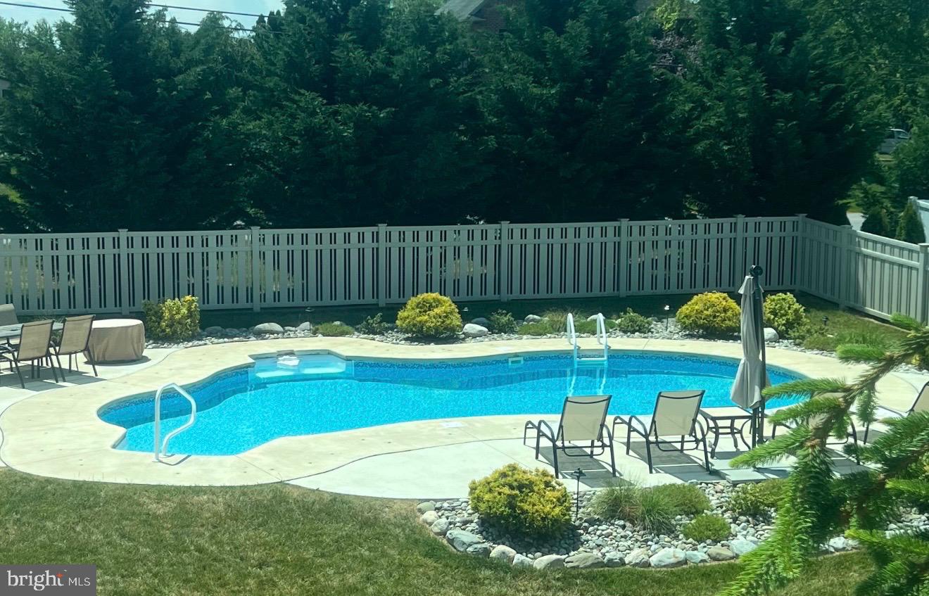 6083 Jennifer Lane Spring Grove, PA 17362 - Photo 45 of 61 a view of a chair and table on the patio