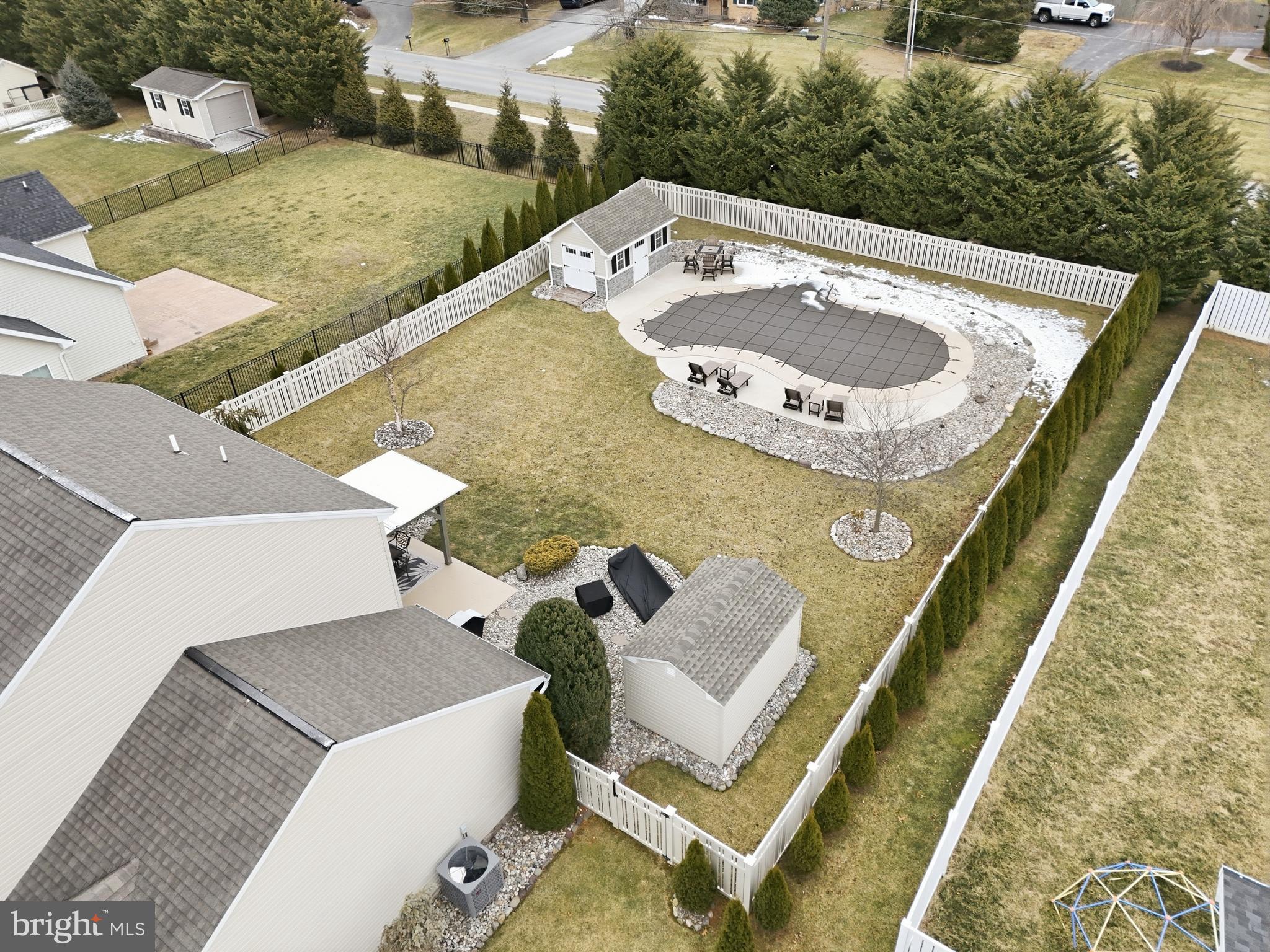 6083 Jennifer Lane Spring Grove, PA 17362 - Photo 51 of 61 a view of a swimming pool with a patio