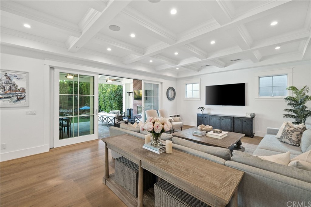 1120 6th Street Manhattan Beach, CA 90266 - Photo 20 of 64 a living room with fireplace furniture and a flat screen tv