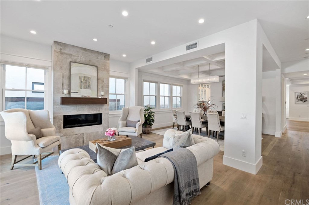 1120 6th Street Manhattan Beach, CA 90266 - Photo 4 of 64 a living room with furniture fireplace and a window