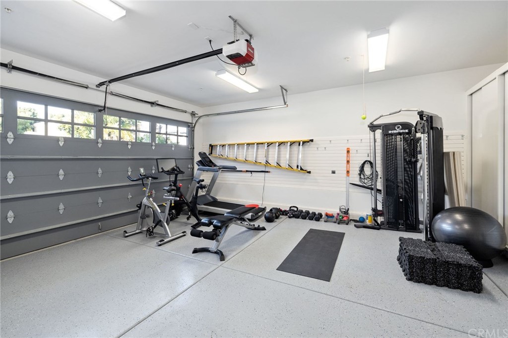 1120 6th Street Manhattan Beach, CA 90266 - Photo 62 of 64 a room with gym equipment and a large window
