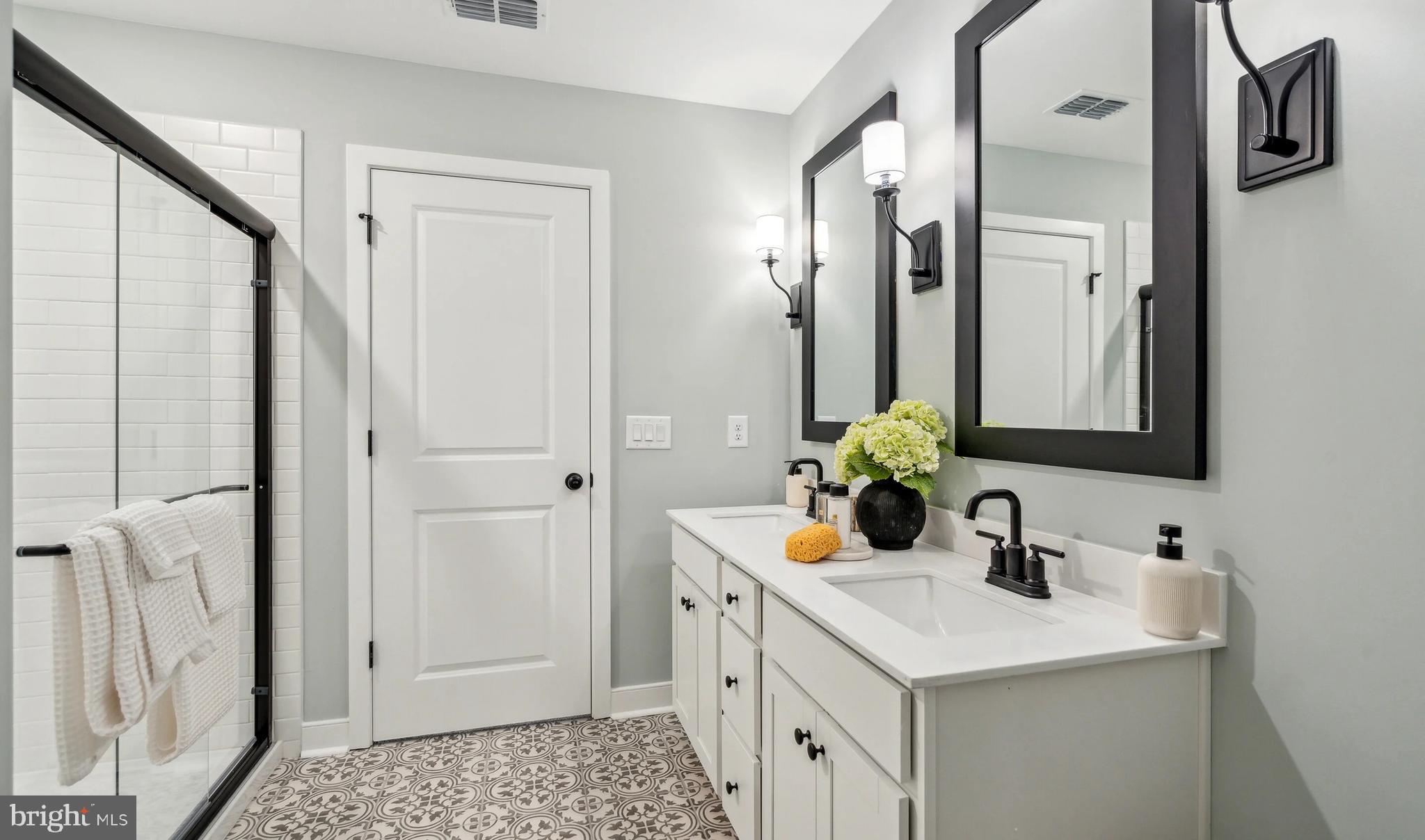 (lot 425-tbd Lot 425-tbd Street Ranson, WV 25438 - Photo 12 of 29 a bathroom with a sink and a mirror