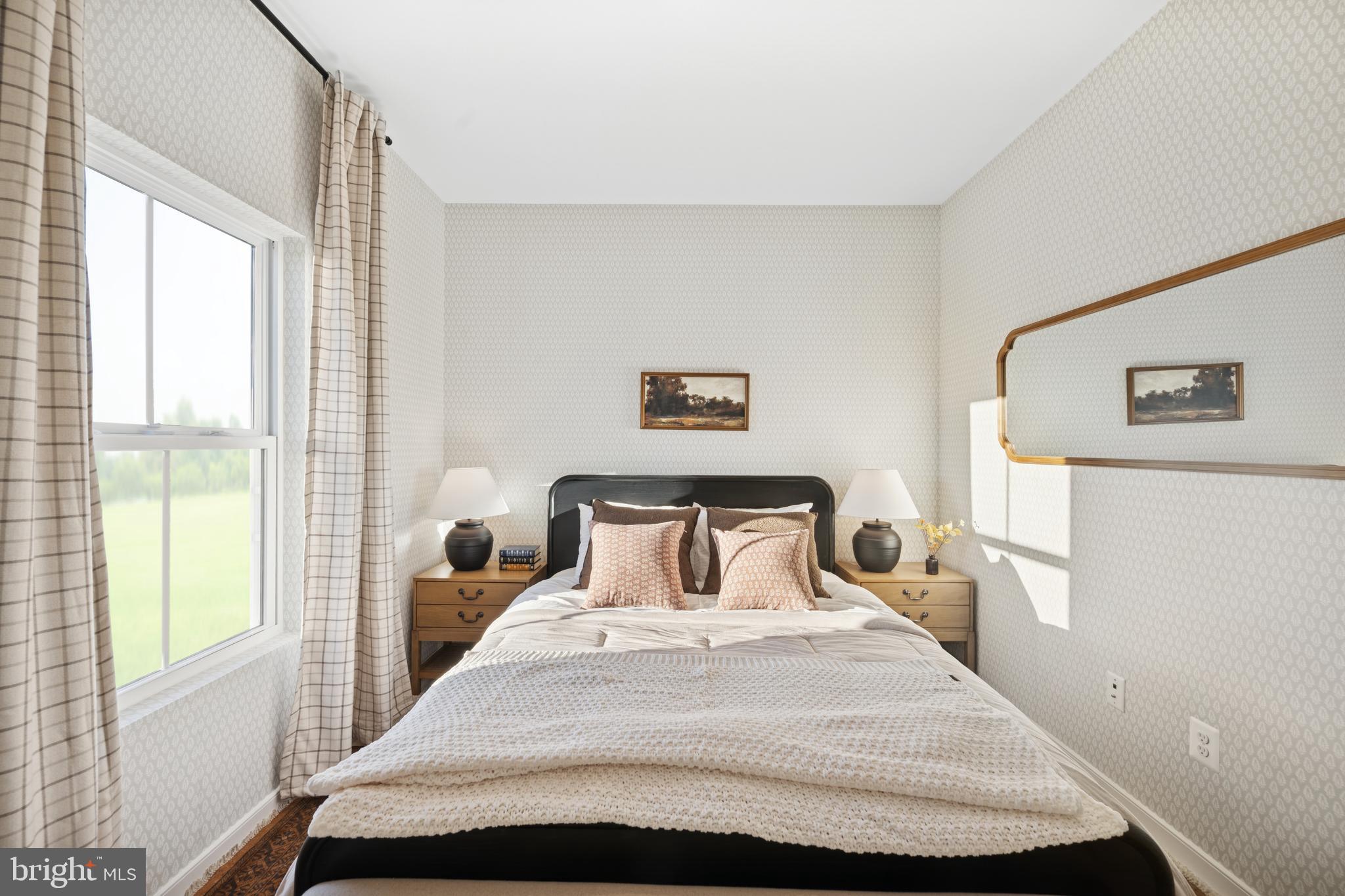 (lot 425-tbd Lot 425-tbd Street Ranson, WV 25438 - Photo 15 of 29 a bedroom with a large bed and a window