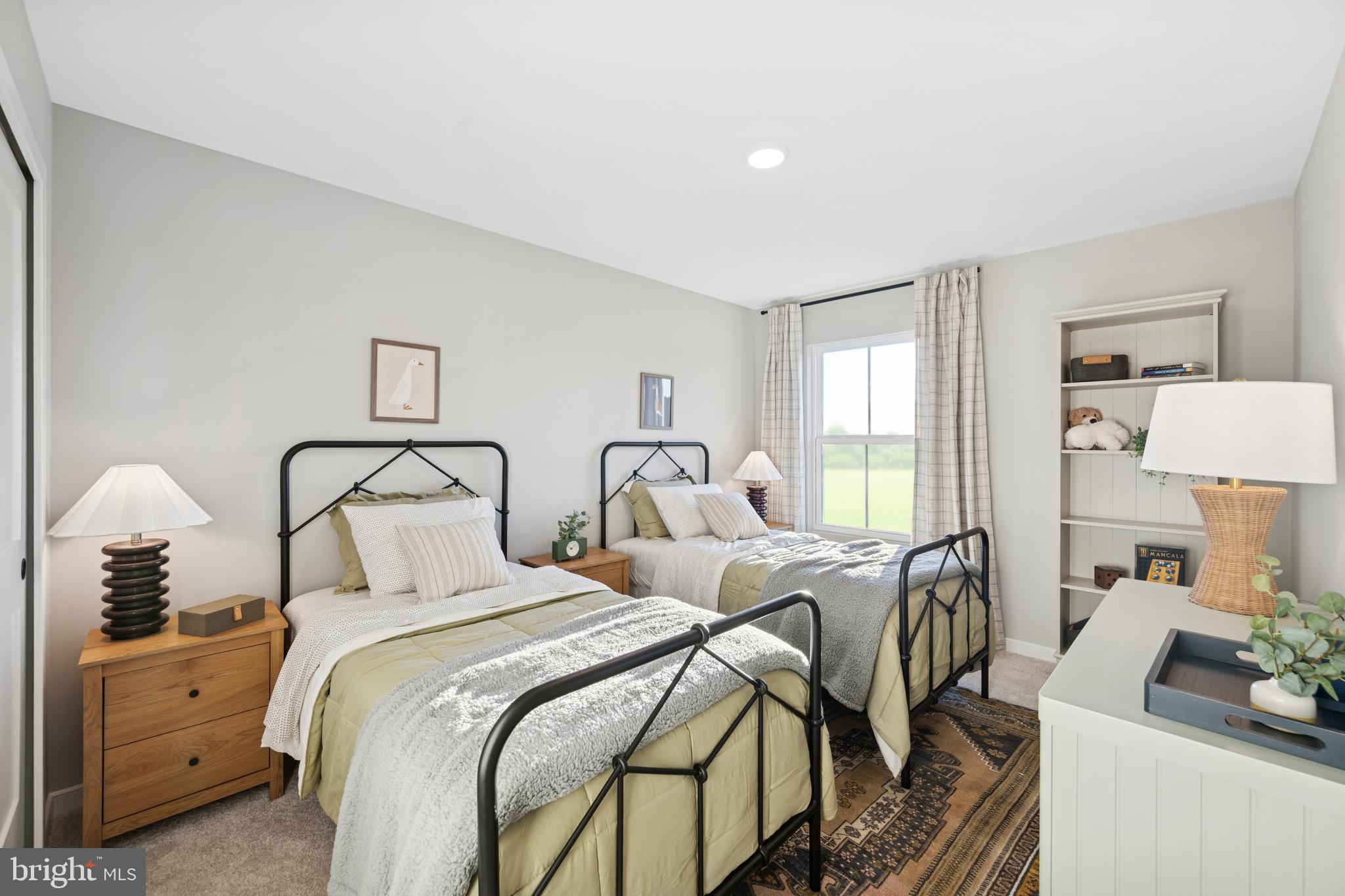 (lot 425-tbd Lot 425-tbd Street Ranson, WV 25438 - Photo 23 of 29 a bedroom with two beds and a couch