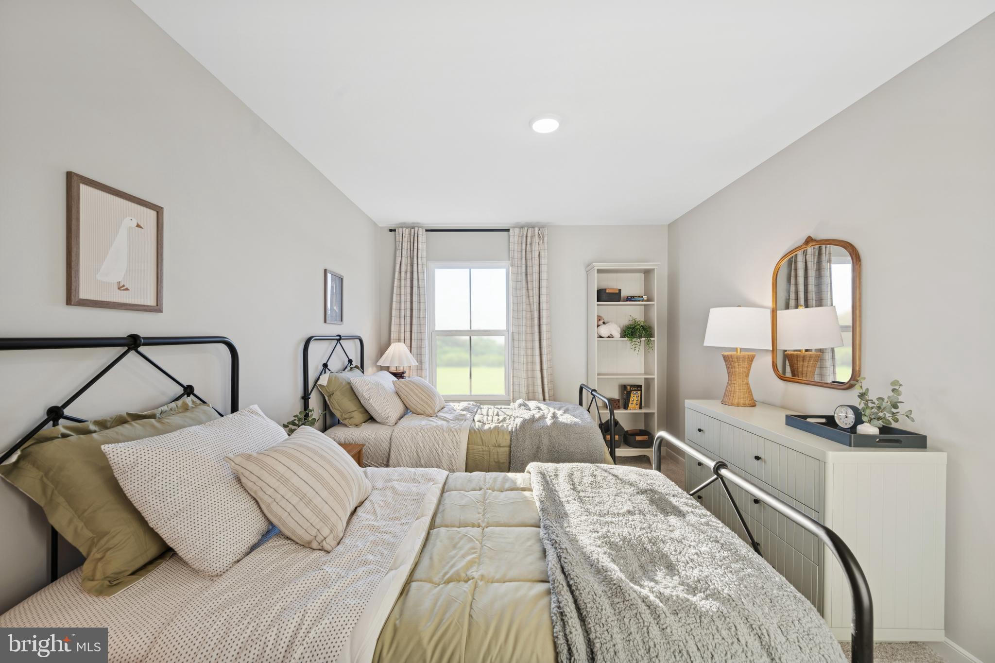 (lot 425-tbd Lot 425-tbd Street Ranson, WV 25438 - Photo 24 of 29 a bedroom with two beds and painting on the wall