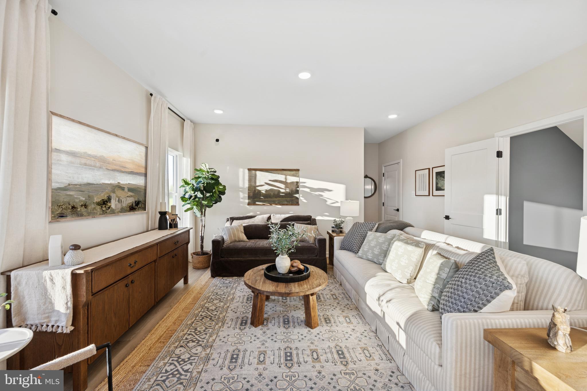 (lot 425-tbd Lot 425-tbd Street Ranson, WV 25438 - Photo 7 of 29 a living room with furniture and a large window