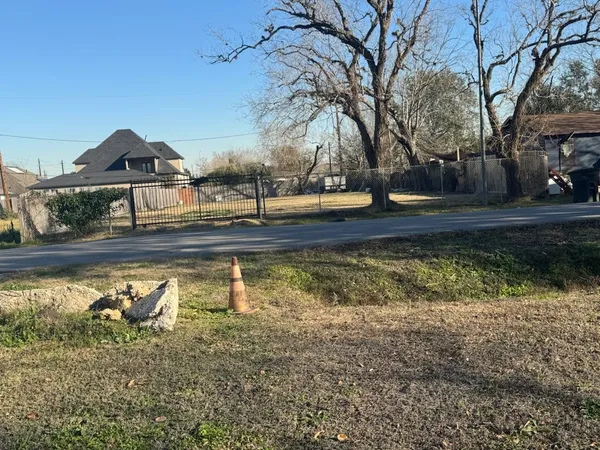 a view of a yard with an outdoor space