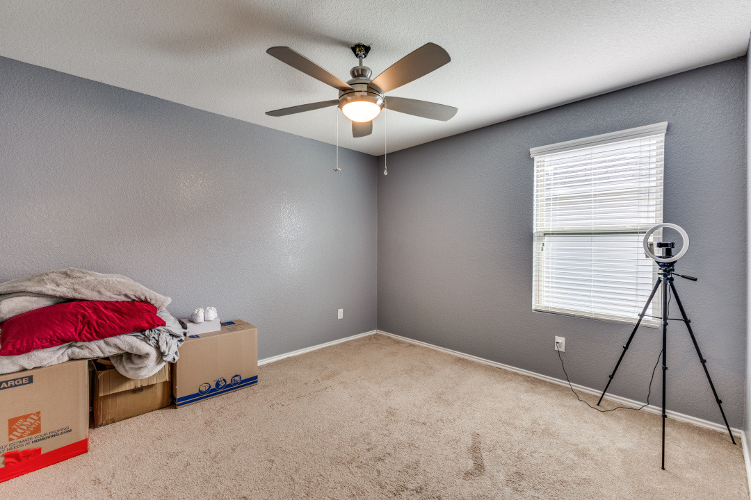 444 Major Lee Lane, Unit 14H Jarrell, TX 76537 - Photo 18 of 22 a workspace with a ceiling fan