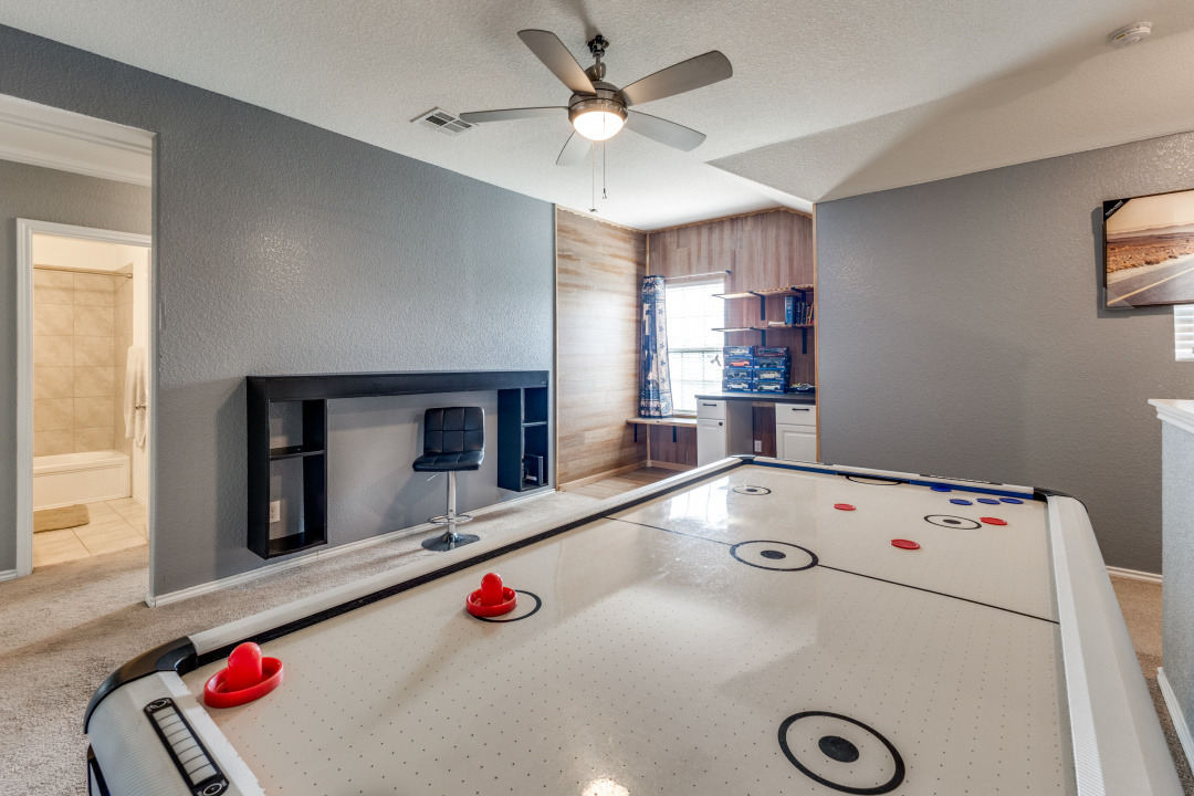 444 Major Lee Lane, Unit 14H Jarrell, TX 76537 - Photo 9 of 22 a utility room with washer and dryer