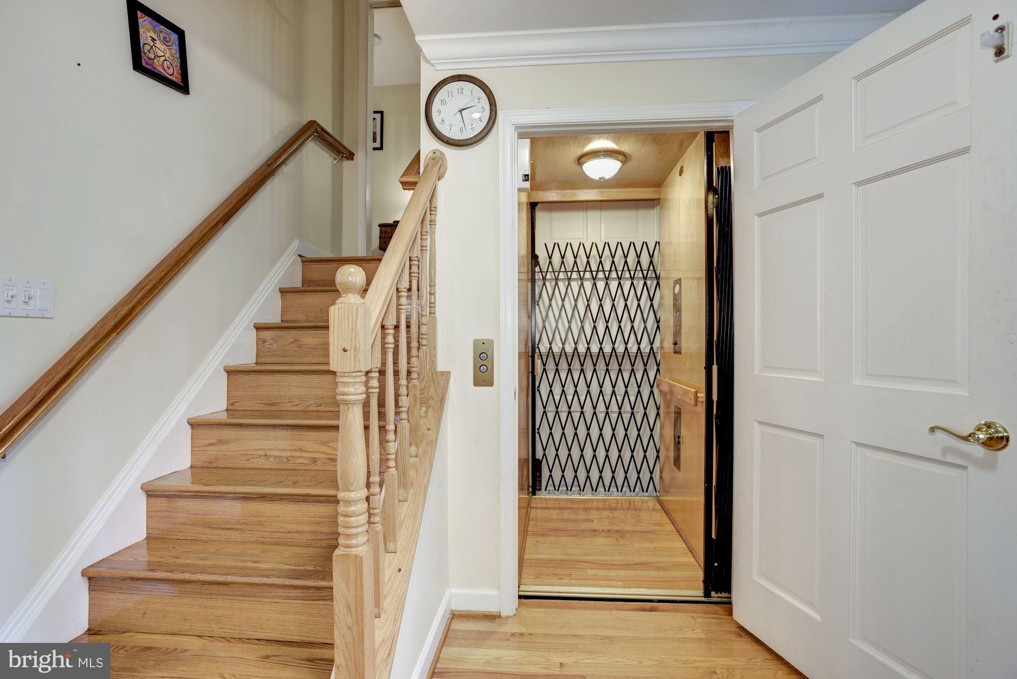 1401 Earnshaw Court Reston, VA 20190 - Photo 14 of 49 Elevator goes to all 4 levels