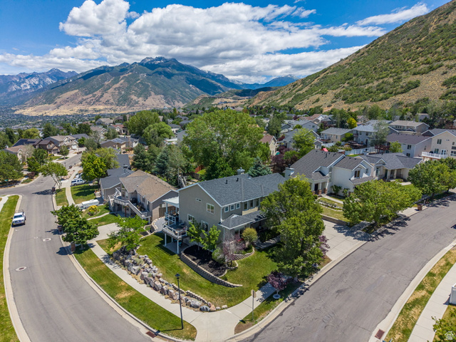 14883 Tooele Lane Draper, UT 84020 - Photo 11 of 49 Residential property featuring a multi-story exterior, attached garage, and multiple decks