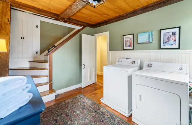 a utility room with dryer and washer