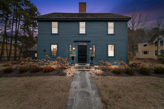 a view of a house with a garden